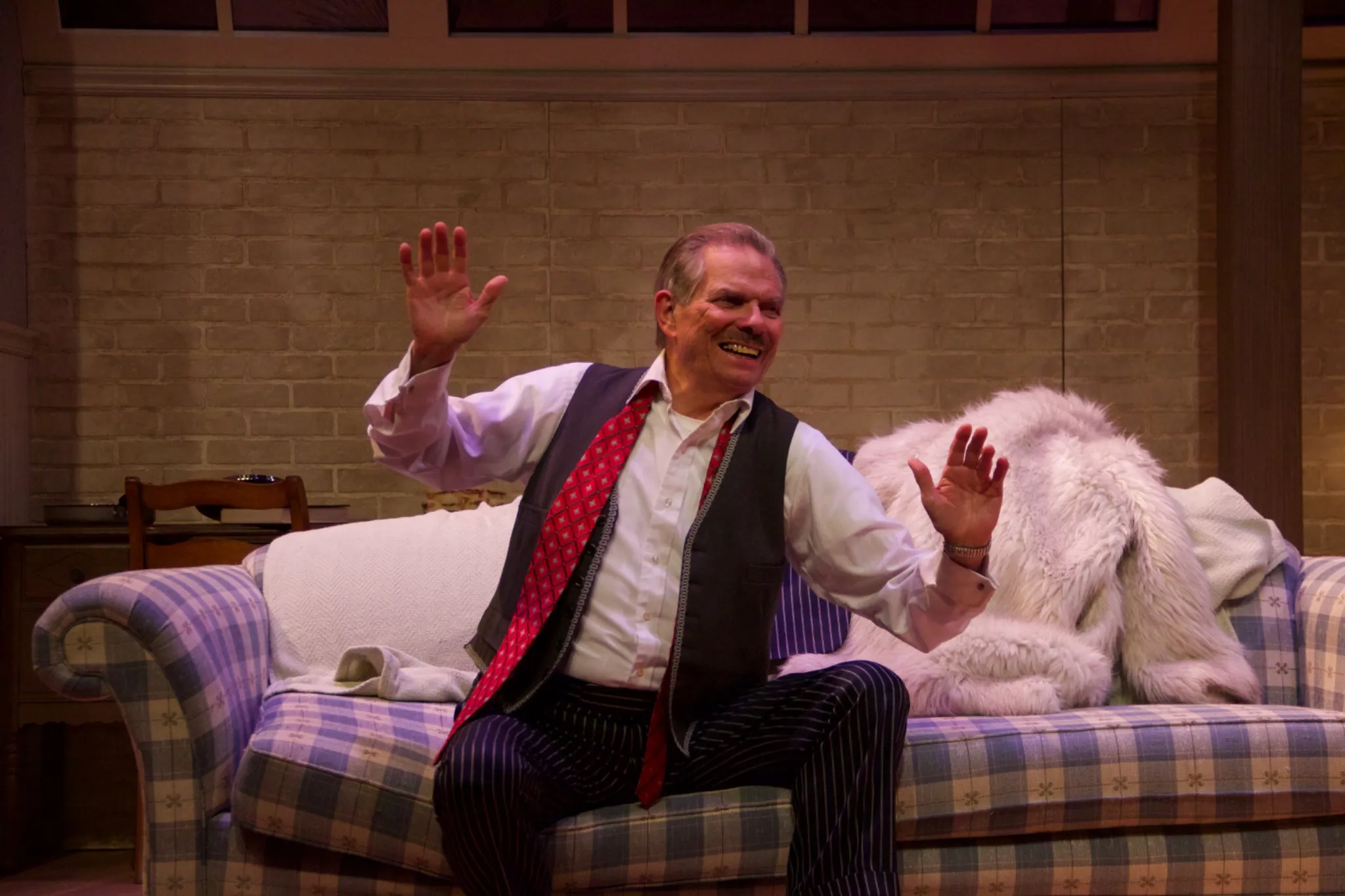 Aged white brick scenic wall from Barefoot in the Park production showing texture layering technique with eggshell white paint and brown washes designed by Brandon PT Davis